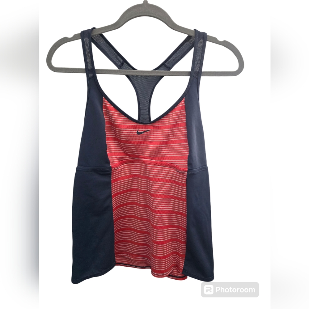 Nike gently worn sporty top with white stripes. Bust padding is not included.